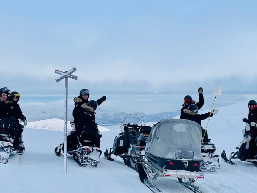 Abisko/Björkliden: Panorama Snowmobile Tour with Snacks - Climbing Toward Čuonjávággi