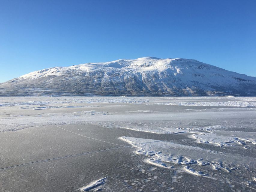 Abisko: Lake Torneträsk Arctic Ice Fishing Trip - Two hours, with a clear rhythm