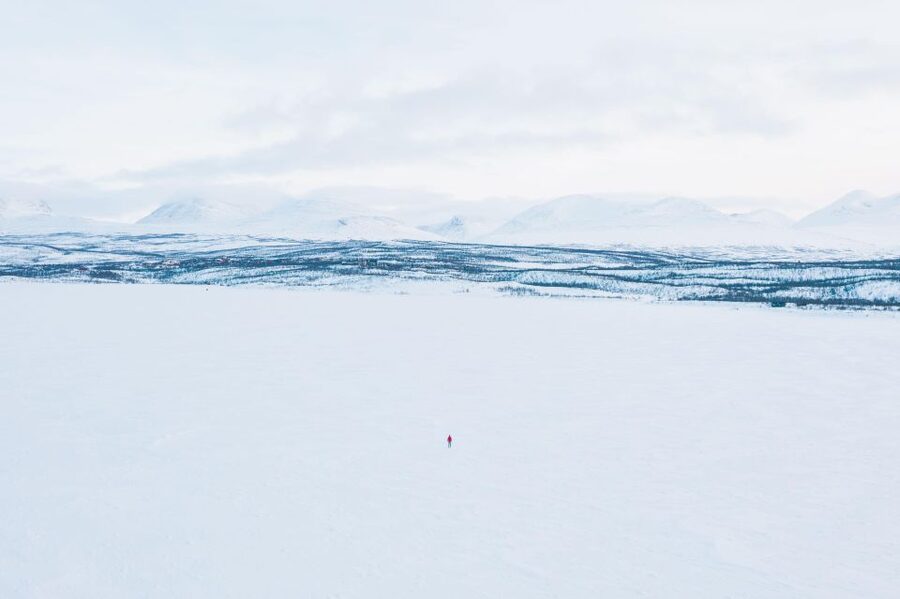 Abisko: Lake Torneträsk Arctic Ice Fishing Trip - The first decision is made by the ice