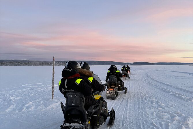 Day tour with snowmobile in Kiruna 10:30 am - Swedish Fika in the Snow