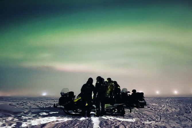 Northern Light snowmobile tour in Kiruna 7:30 pm - Getting ready for the snowmobile