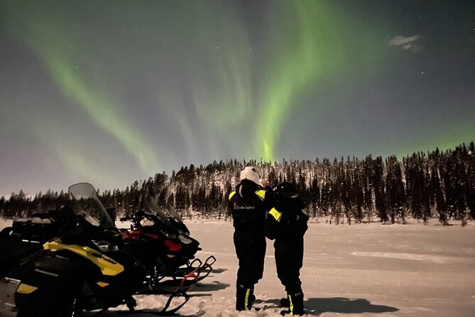 Northern Light snowmobile tour in Kiruna 7:30 pm - Riding through forest, snow, and open country
