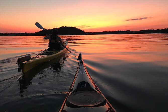 PRIVATE Sunset Kayaking in Stockholm Archipelago Nature Reserve - A shore stop with Swedish Fika
