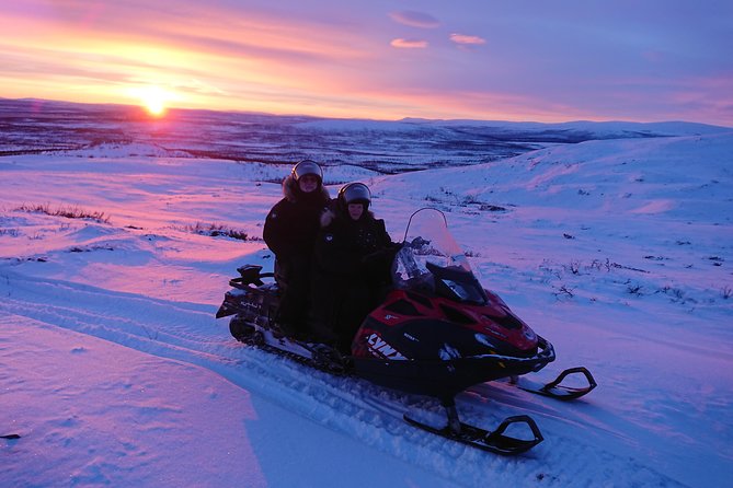 Snowmobile Safari to Lapland viewpoint - A snowmobile trip with a real destination