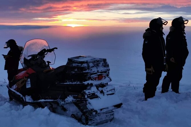 Snowmobile Safari to Lapland viewpoint - Arctic clothing keeps the focus on the ride