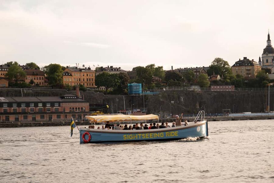 Stockholm: Guided City Sightseeing Open Electric Boat Tour - What the guide adds to a short cruise
