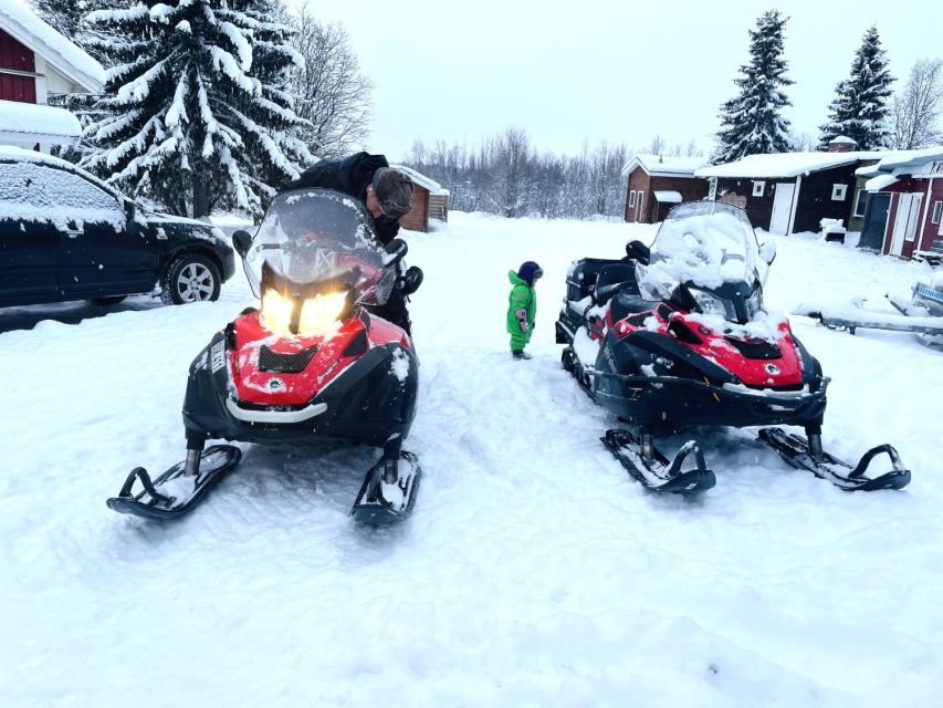 Wilderness Tour with Snowmobile & Ice Fishing - Riding across frozen lakes and quiet forests